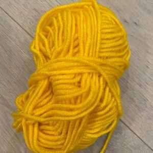 Bright yellow thin wool blend yarn